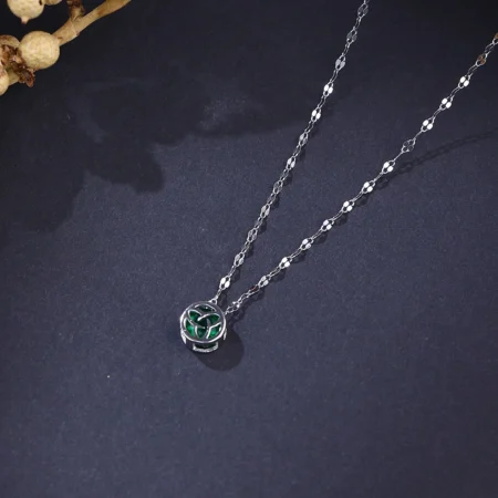 The Alencia Urban Emerald Triquetra Cage Necklace