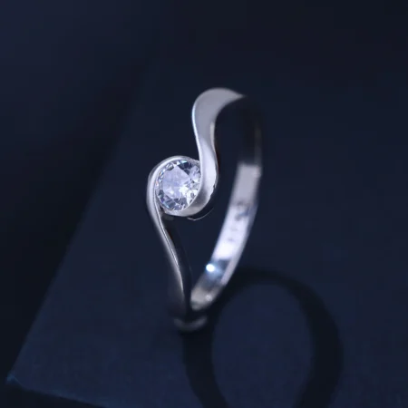 The Alencia Urban Serenade Wave Bypass Solitaire Ring