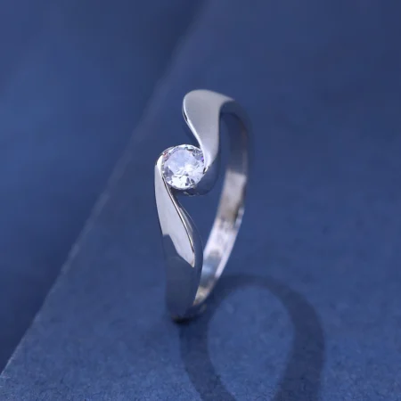 The Alencia Urban Serenade Peak Bypass Solitaire Ring