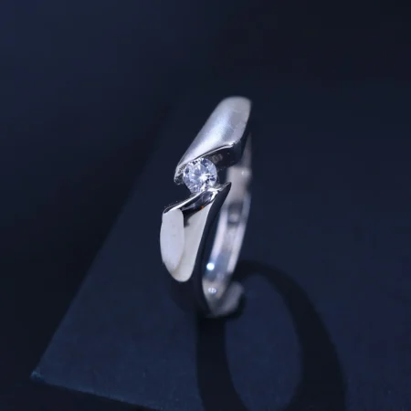 The Alencia Urban Serenade Peak Bypass Solitaire Ring