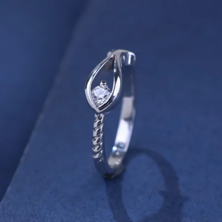 The Alencia Urban Serenade Teardrop Twist Solitaire Ring