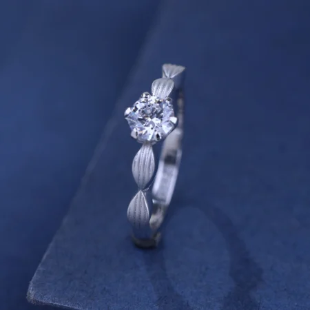 The Alencia Urban Serenade Fluted Petal Solitaire Ring